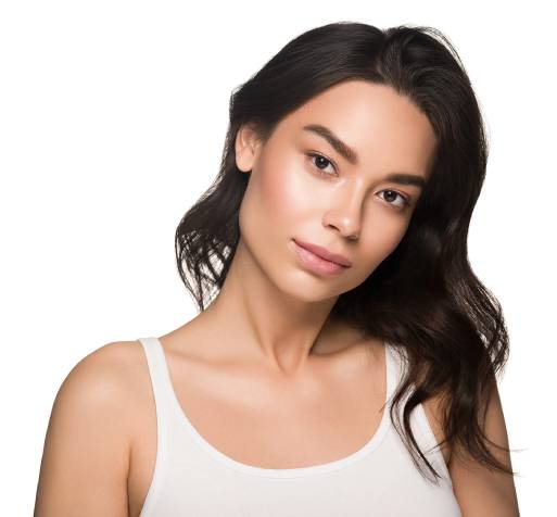 Gorgeous young woman with long, dark brown hair and perfect, glowing skin wears a white tank top and models for the testimonial section of the homepage for Bloom Aesthetics and Wellness.