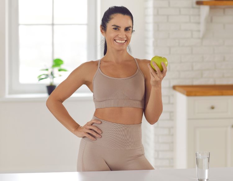 Woman in a healthy lifestyle promoting weight loss injections, a service offered at Bloom Aesthetics and Wellness in Jacksonville, NC