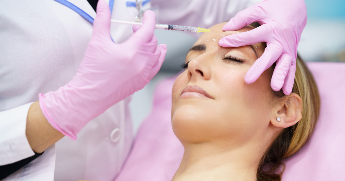 woman getting Botox in the upper middle forehead